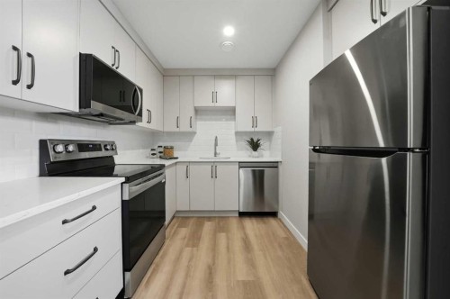 114 Palmer Circle, Blackfalds, AB - Indoor Photo Showing Kitchen With Upgraded Kitchen