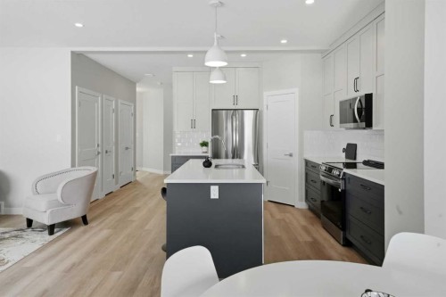 114 Palmer Circle, Blackfalds, AB - Indoor Photo Showing Kitchen With Upgraded Kitchen