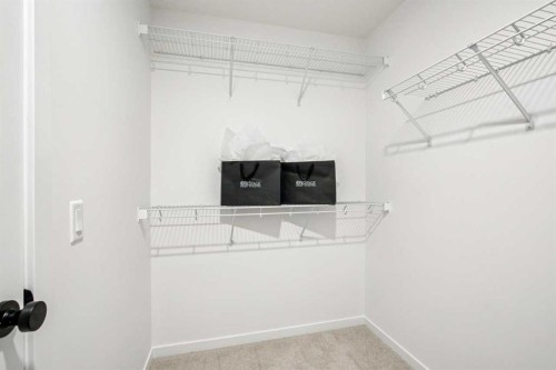 98 Creekstone Place Sw, Calgary, AB - Indoor With Storage