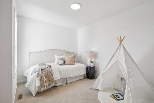 98 Creekstone Place Sw, Calgary, AB - Indoor Photo Showing Bedroom