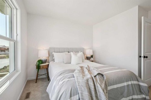 98 Creekstone Place Sw, Calgary, AB - Indoor Photo Showing Bedroom
