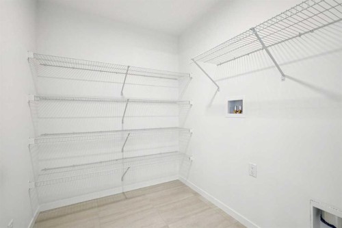 98 Creekstone Place Sw, Calgary, AB - Indoor With Storage