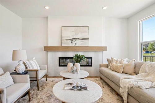 98 Creekstone Place Sw, Calgary, AB - Indoor Photo Showing Living Room With Fireplace