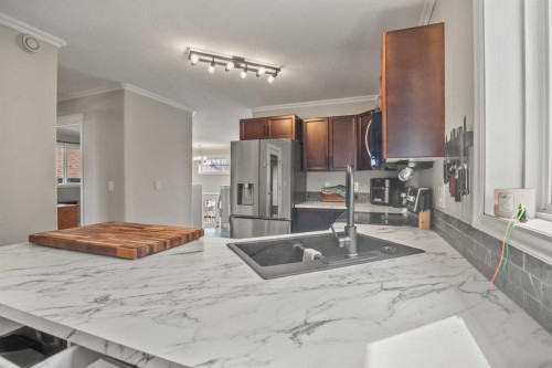 44 White Avenue, Red Deer, AB - Indoor Photo Showing Kitchen With Stainless Steel Kitchen With Double Sink