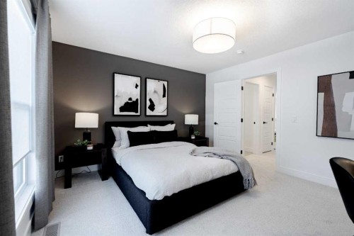 236 Amblestone Crescent Nw, Calgary, AB - Indoor Photo Showing Bedroom