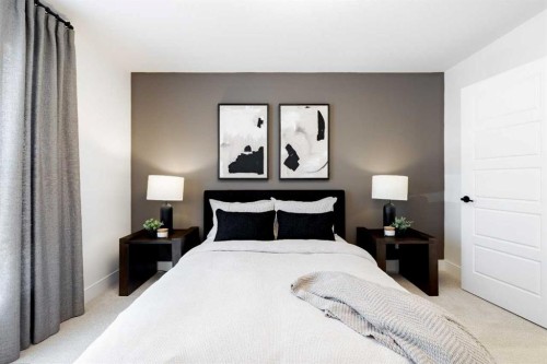 236 Amblestone Crescent Nw, Calgary, AB - Indoor Photo Showing Bedroom