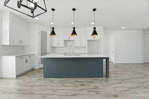 4240 Bauman Way, Innisfail, AB - Indoor Photo Showing Kitchen With Upgraded Kitchen