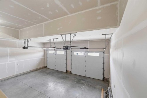 4240 Bauman Way, Innisfail, AB - Indoor Photo Showing Garage