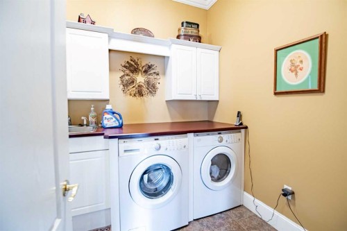 295 Jarvis Glen Close, Jarvis Bay, AB - Indoor Photo Showing Laundry Room