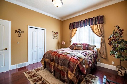 295 Jarvis Glen Close, Jarvis Bay, AB - Indoor Photo Showing Bedroom