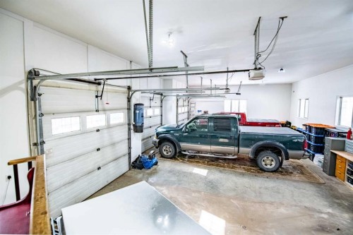 295 Jarvis Glen Close, Jarvis Bay, AB - Indoor Photo Showing Garage