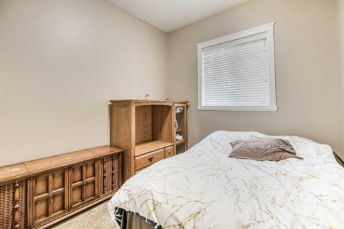 18 Mackenzie Crescent, Lacombe, AB - Indoor Photo Showing Bedroom
