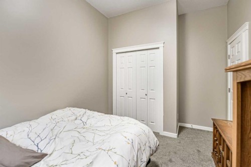 18 Mackenzie Crescent, Lacombe, AB - Indoor Photo Showing Bedroom