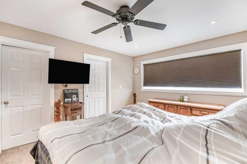 18 Mackenzie Crescent, Lacombe, AB - Indoor Photo Showing Bedroom