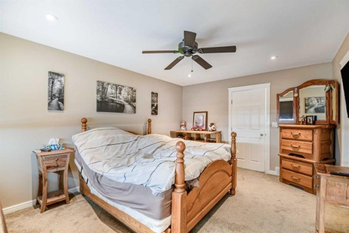 18 Mackenzie Crescent, Lacombe, AB - Indoor Photo Showing Bedroom