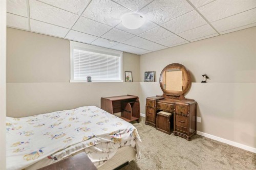 18 Mackenzie Crescent, Lacombe, AB - Indoor Photo Showing Bedroom