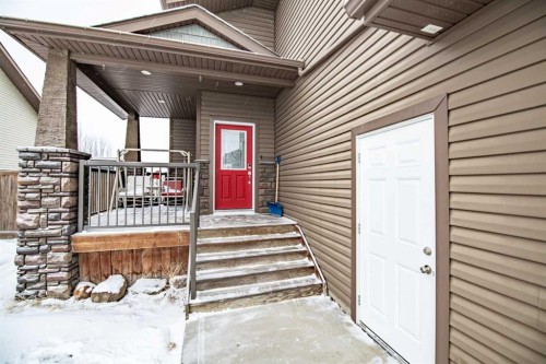 18 Mackenzie Crescent, Lacombe, AB - Outdoor With Deck Patio Veranda With Exterior