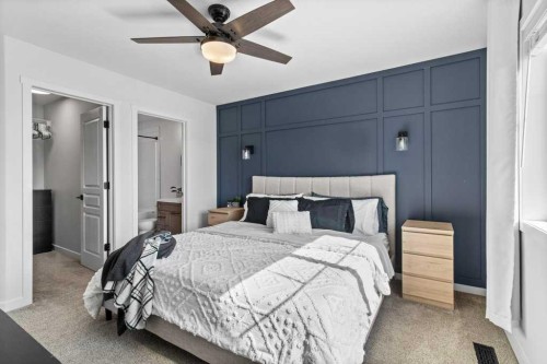 157 Hampton Crescent, Sylvan Lake, AB - Indoor Photo Showing Bedroom