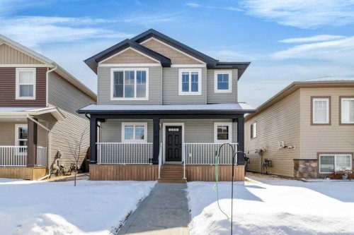 157 Hampton Crescent, Sylvan Lake, AB - Outdoor With Deck Patio Veranda With Facade