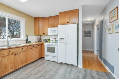 3601 41 Avenue, Red Deer, AB - Indoor Photo Showing Kitchen With Double Sink