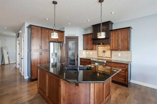 146 Sutherland Close, Red Deer, AB - Indoor Photo Showing Kitchen With Stainless Steel Kitchen With Double Sink With Upgraded Kitchen