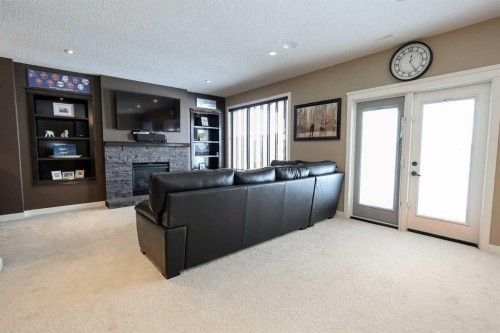 146 Sutherland Close, Red Deer, AB - Indoor With Fireplace