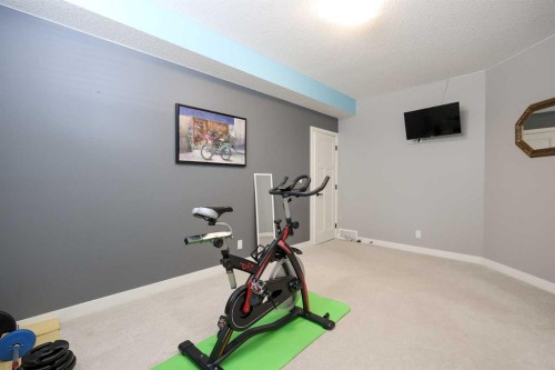 146 Sutherland Close, Red Deer, AB - Indoor Photo Showing Gym Room