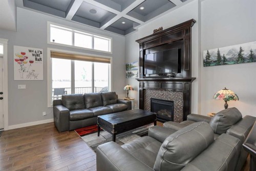 146 Sutherland Close, Red Deer, AB - Indoor Photo Showing Living Room With Fireplace