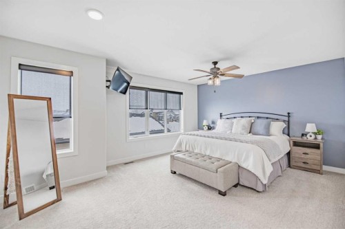 52 Iron Gate Boulevard, Sylvan Lake, AB - Indoor Photo Showing Bedroom