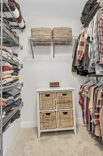 52 Iron Gate Boulevard, Sylvan Lake, AB - Indoor With Storage