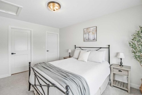 52 Iron Gate Boulevard, Sylvan Lake, AB - Indoor Photo Showing Bedroom