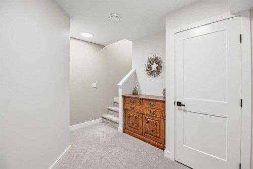 52 Iron Gate Boulevard, Sylvan Lake, AB - Indoor Photo Showing Other Room