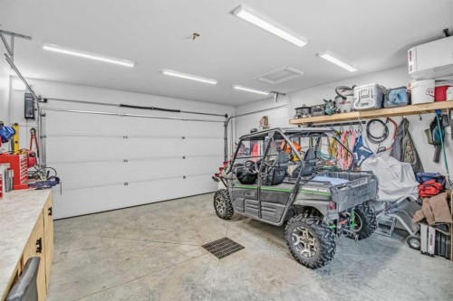 52 Iron Gate Boulevard, Sylvan Lake, AB - Indoor Photo Showing Garage