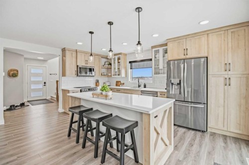 52 Iron Gate Boulevard, Sylvan Lake, AB - Indoor Photo Showing Kitchen With Upgraded Kitchen