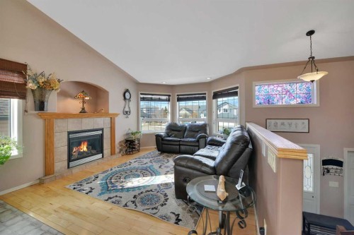 810 800 Ramage Close, Red Deer, AB - Indoor Photo Showing Living Room With Fireplace
