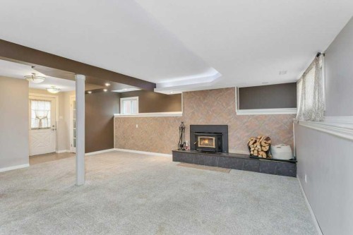 7 Nellis Avenue, Red Deer, AB - Indoor With Fireplace