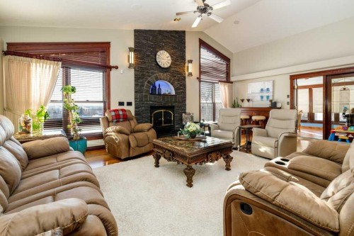 85 Oberlin Avenue, Red Deer, AB - Indoor Photo Showing Living Room With Fireplace