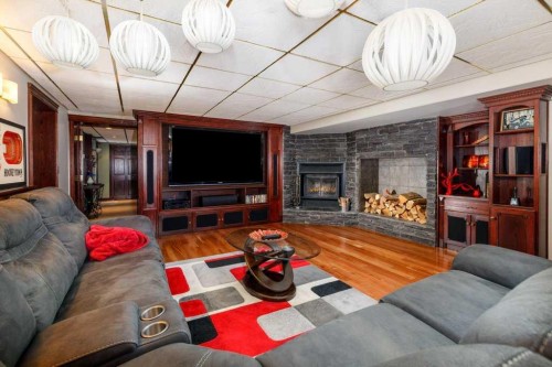 85 Oberlin Avenue, Red Deer, AB - Indoor Photo Showing Living Room With Fireplace