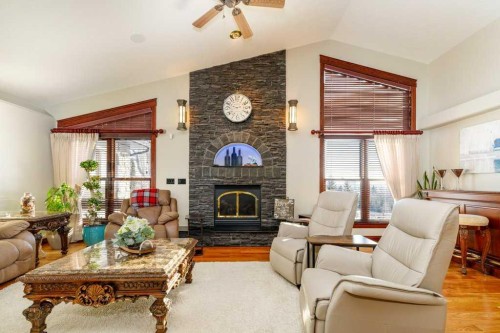 85 Oberlin Avenue, Red Deer, AB - Indoor Photo Showing Living Room With Fireplace