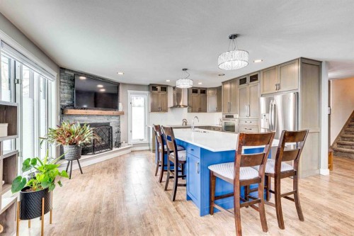 211 4 Avenue Se, Three Hills, AB - Indoor Photo Showing Dining Room With Fireplace