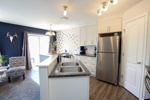 60 Arnold Close, Red Deer, AB - Indoor Photo Showing Kitchen With Stainless Steel Kitchen With Double Sink