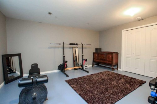 60 Arnold Close, Red Deer, AB - Indoor Photo Showing Gym Room