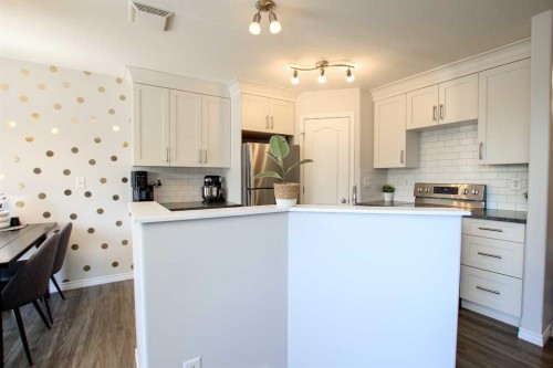 60 Arnold Close, Red Deer, AB - Indoor Photo Showing Kitchen With Upgraded Kitchen