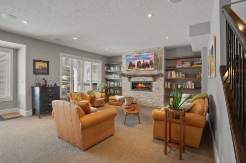 24 Sawyer Close, Red Deer, AB - Indoor Photo Showing Living Room With Fireplace