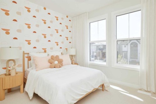 9 Shawnee Passage Sw, Calgary, AB - Indoor Photo Showing Bedroom