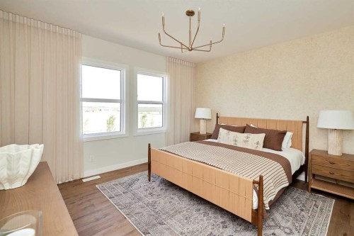 9 Shawnee Passage Sw, Calgary, AB - Indoor Photo Showing Bedroom
