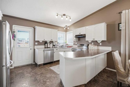 66 Jack Crescent, Red Deer, AB - Indoor Photo Showing Kitchen With Double Sink With Upgraded Kitchen