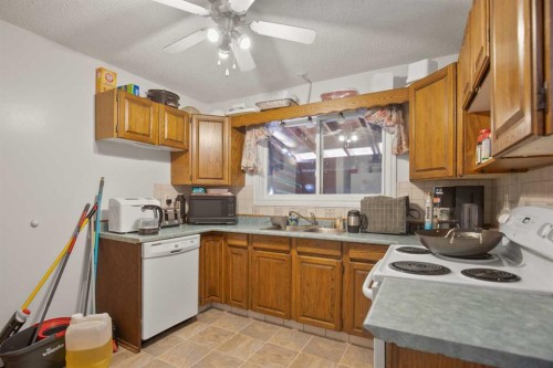 30 Greig Drive, Red Deer, AB - Indoor Photo Showing Kitchen With Double Sink