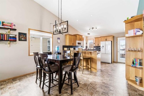 22 Mcdougall Close, Penhold, AB - Indoor Photo Showing Dining Room