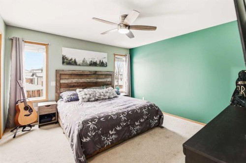 22 Mcdougall Close, Penhold, AB - Indoor Photo Showing Bedroom
